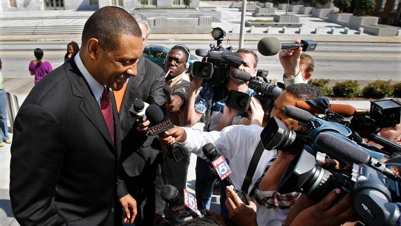 Vernon Jones, surrounded by news media outside the federal court in Atlanta  on April 1, 2010. (Curtis Compton / ccompton@ajc.com)