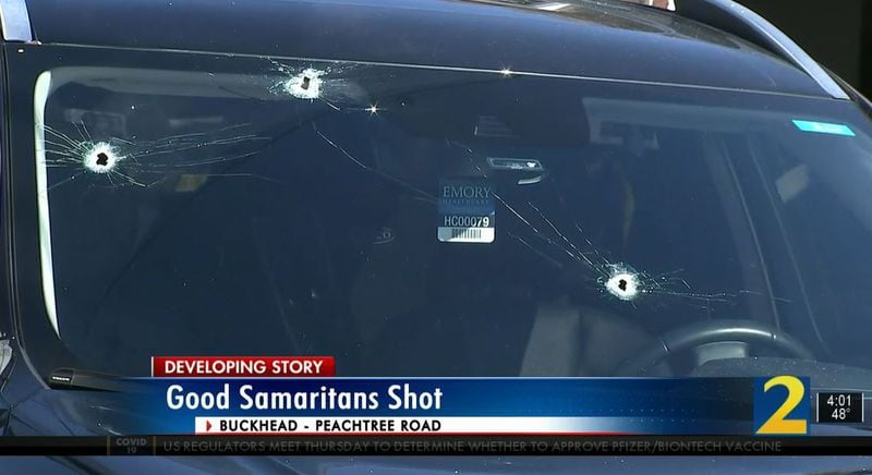 Two men attempted to steal this black Volvo on Tuesday morning. The suspects started shooting at two good Samaritans who tried to stop them, police said.