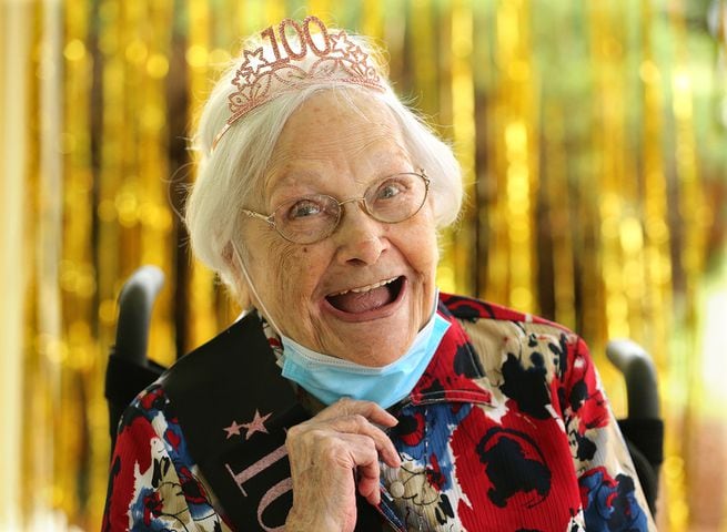 Photos: COVID-19 survivor celebrates 100th birthday