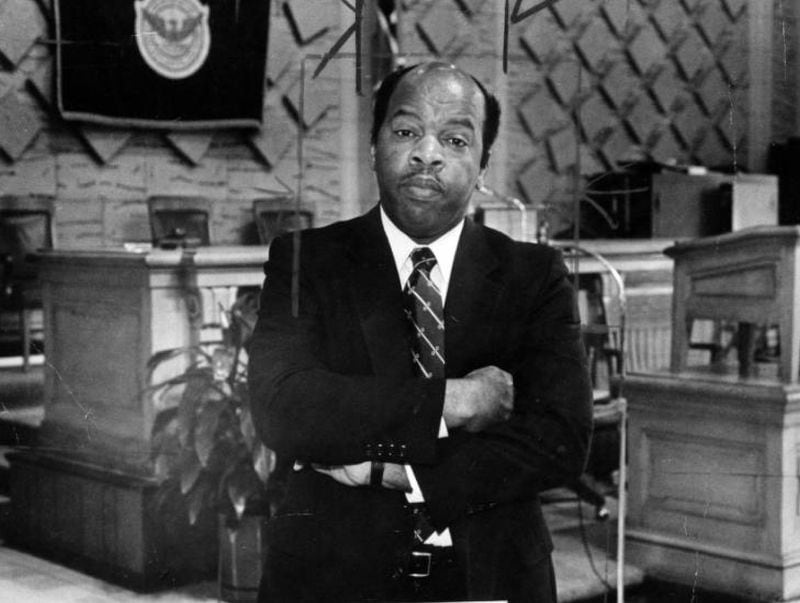 John Lewis poses for a portrait in the Atlanta City Council chambers on Feb. 16, 1983. Fellow City Councilman Bill Campbell said of Lewis in 1982, "People mistake John's personality for one that's easy to bend. He's so agreeable, he seems like the last person who could violently disagree with you." (Cheryl Bray / AJC Archive at GSU Library AJCP452-149d)