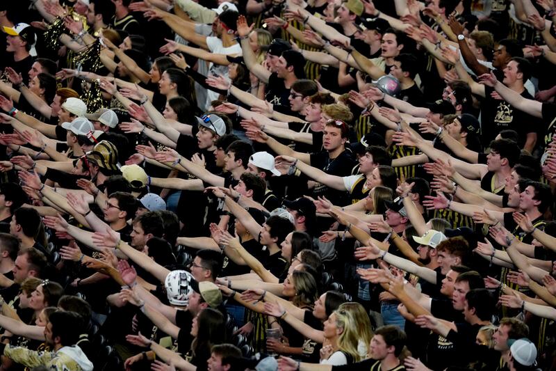Purdue fans cheer during the second half of the NCAA college basketball game against NC State at the Final Four, Saturday, April 6, 2024, in Glendale, Ariz. (AP Photo/Ross D. Franklin)