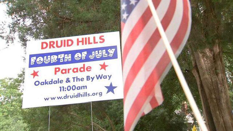 The organizers of an annal Fourth of July parade in Druid Hills say hundreds of American flags were stolen along the 1-mile route.