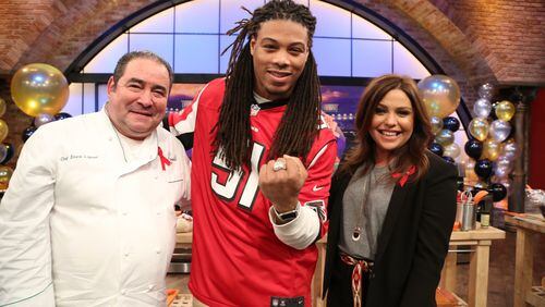 Falcons linebacker Philip Wheeler showing off his ring for winning Rachael Ray's Super Bowl recipe playoff. Photo: David M. Russell/Rachael Ray Show ©2016 King World Productions.
