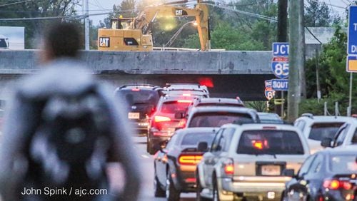 Piedmont Road traffic was packed heading toward the I-85 collapse Monday. JOHN SPINK / JSPINK@AJC.COM