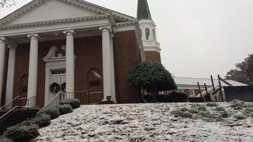 Snow falls Friday on First Christian Church of Decatur on West Ponce de Leon Avenue in Decatur.