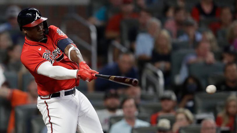 Braves outfielder Jorge Soler hits a single against the Miami Marlins during the fifth inning Friday, Sept. 10, 2021, at Truist Park in Atlanta. There was an error, and three runs scored, and Soler advanced to second. (Ben Margot/AP)