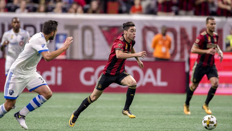 Atlanta United's Miguel Almiron dribbles against Montreal on Sunday at Mercedes-Benz Stadium. Almiron left with an injury. (Eric Rossitch \  Atlanta United)