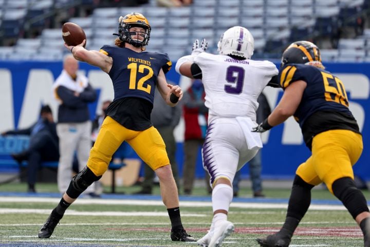 Prince Avenue Christian quarterback Brock Vandagriff (12) attempts a pass in the first half against Trinity Christian during the Class 1A Private championship at Center Parc Stadium Monday, December 28, 2020 in Atlanta, Ga.. JASON GETZ FOR THE ATLANTA JOURNAL-CONSTITUTION