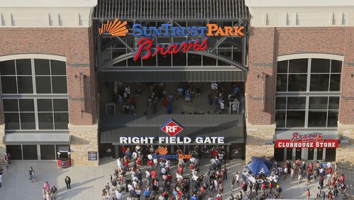 Fans enter SunTrust Park for the Atlanta Braves home opener of the 2017 season.