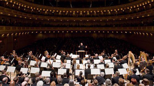 The Atlanta Symphony Orchestra in concert at Carnegie Hall, conducted by music director Robert Spano.