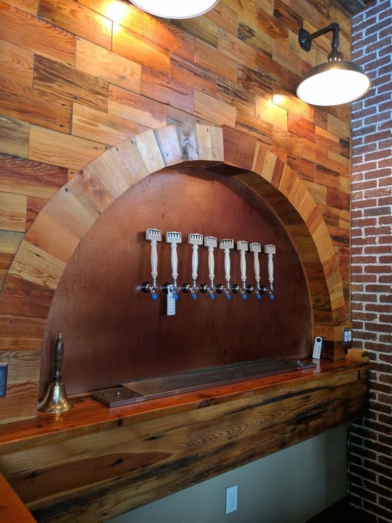 Arches Brewing, a lager-focused brewery that opened in Hapeville in 2016, has a tasting room, as well as a casual beer garden out back. CONTRIBUTED BY PAULA PONTES