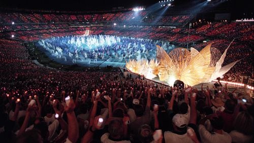 Part of the pageantry and color of Opening Ceremonies Friday night, July 19, 1996.  (Cox staff photo/Allen Eyestone)  7/96