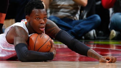 ATLANTA, GA - FEBRUARY 19: Dennis Schroder #17 of the Atlanta Hawks reacts after drawing a foul from Beno Udrih #19 of the Miami Heat at Philips Arena on February 19, 2016 in Atlanta, Georgia. NOTE TO USER User expressly acknowledges and agrees that, by downloading and or using this photograph, user is consenting to the terms and conditions of the Getty Images License Agreement. (Photo by Kevin C. Cox/Getty Images)