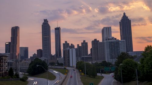The sun sets along the downtown Atlanta skyline seen from the Jackson Street bridge, Monday, May 14, 2018. ALYSSA POINTER/ATLANTA JOURNAL-CONSTITUTION
