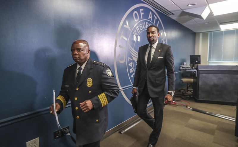Atlanta police Chief Rodney Bryant (left) and Mayor Andre Dickens said they plan to crack down on street racing and repeat offenders. (John Spink/John.Spink@ajc.com)

