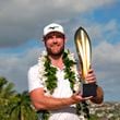 Grayson Murray holds the trophy after winning the Sony Open golf event, Sunday, Jan. 14, 2024, at Waialae Country Club in Honolulu. AP Photo/Matt York, File)