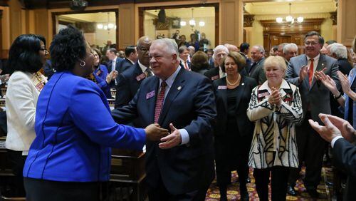 David Ralston receives congratulations Monday from House Minority Leader Stacey Abrams, D-Atlanta, after he was re-elected speaker of the Georgia House on the first day of 2017 legislative session. BOB ANDRES /BANDRES@AJC.COM