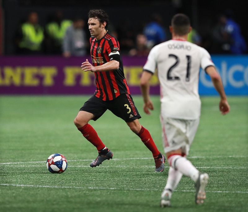 Atlanta United defender Michael Parkhurst, playing in his final game, works against Toronto FC during the first half in the Eastern Conference Final on Wednesday, October 30, 2019, in Atlanta.   Curtis Compton/ccompton@ajc.com