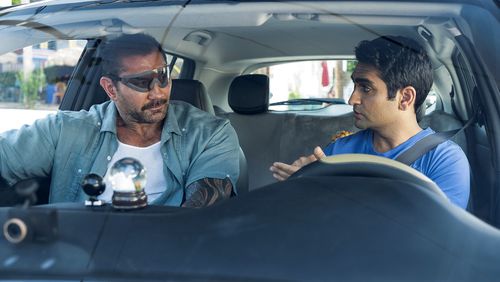 Dave Bautista, left, plays a police detective recovering from eye surgery, and Kumail Nanjiani is his Uber driver in “Stuber.” Mark Hill, Twentieth Century Fox