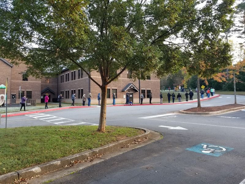 Voters waited in line at Noonday Baptist Church in Cobb County on Tuesday, Nov. 3, 2020.