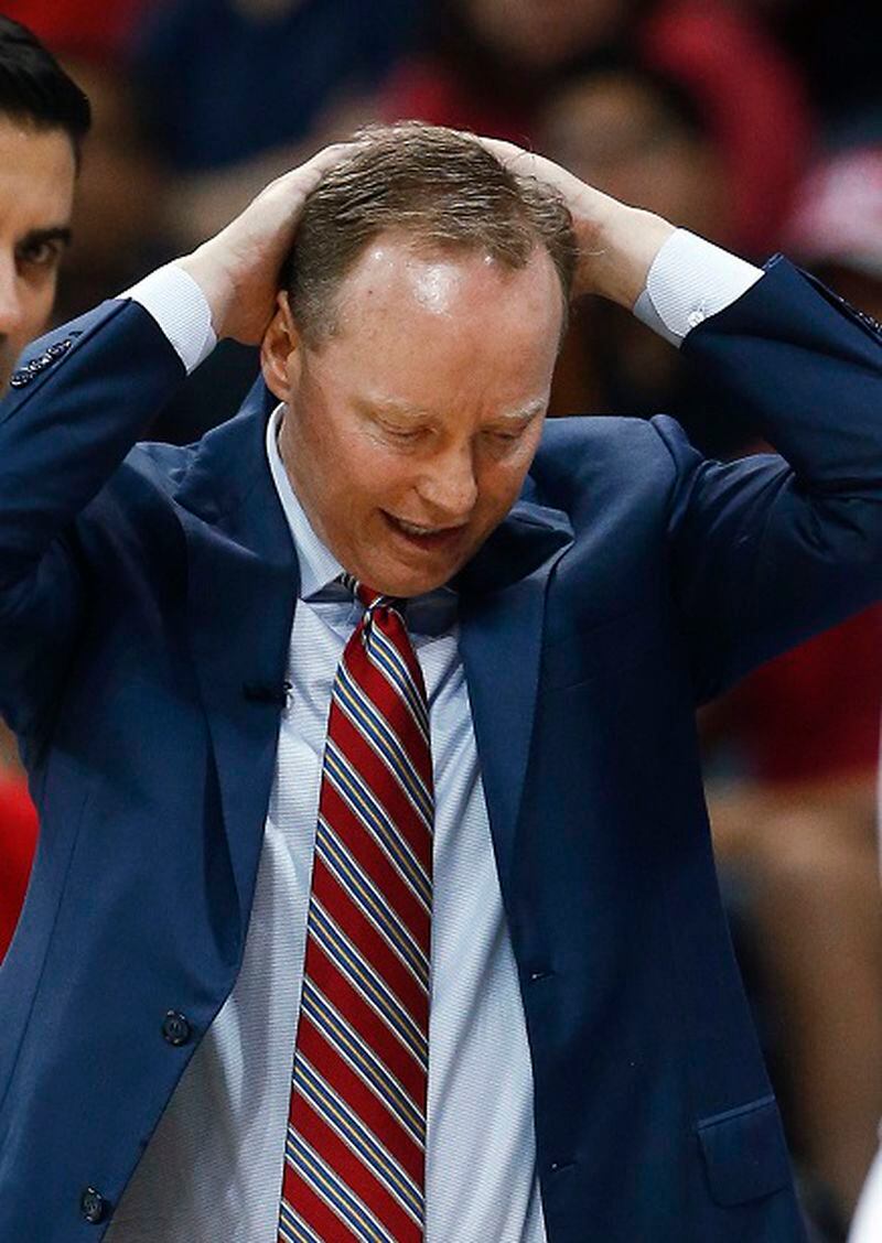 Atlanta Hawks coach Mike Budenholzer reacts during the second half of Game 2 of a first-round NBA playoff basketball playoff series against the Brooklyn Nets, Wednesday, April 22, 2015, in Atlanta. Atlanta won 96-91. (AP Photo/John Bazemore) The sky's not falling. Neither are the shots. (AP Photo/John Bazemore)