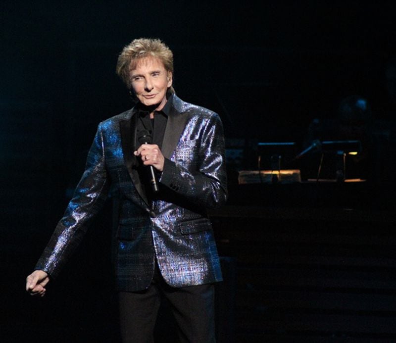  In addition to his trove of hits, Manilow performed some new material as well. Photo: Melissa Ruggieri/AJC