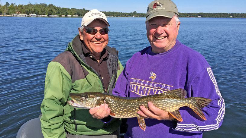 Longtime Brainerd-Nisswa area fishing guide Marv Koep, left, with Fr. Mike Arms, a regular walleye-angliing partner and retired Catholic priest who moved from the Twin Cities to Crosslake and now lives in a lake cabin that has been in his family for 80 years. (Dennis Anderson/Minneapolis Star Tribune/TNS)