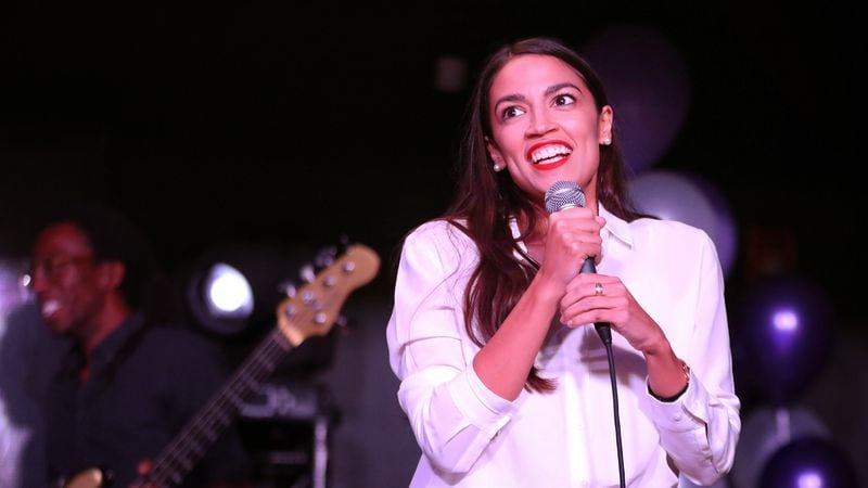 lexandria Ocasio-Cortez addresses the crowd gathered at La Boom night club in Queens on November 6, 2018 in New York City. With her win against Republican Anthony Pappas, Ocasio-Cortez became the youngest woman elected to Congress.