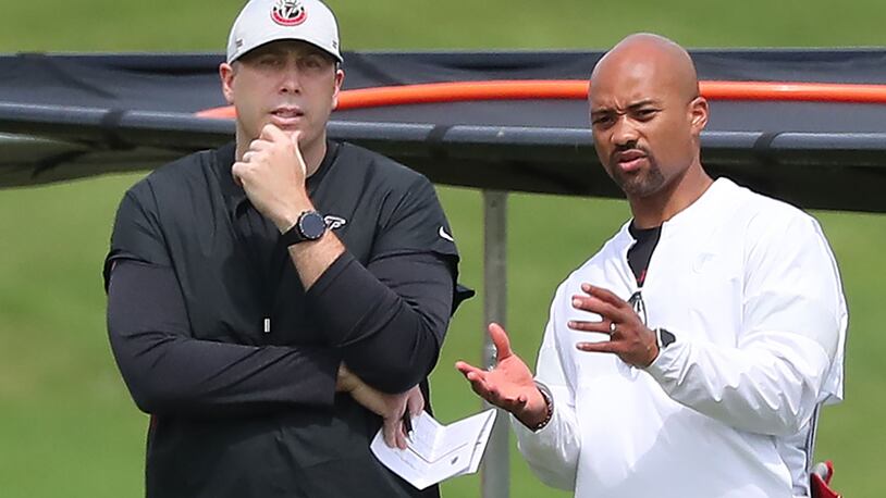 Falcons coach Arthur Smith (left) and general manager Terry Fontenot might make some trades if the deal makes sense. (Curtis Compton/ccompton@ajc.com)