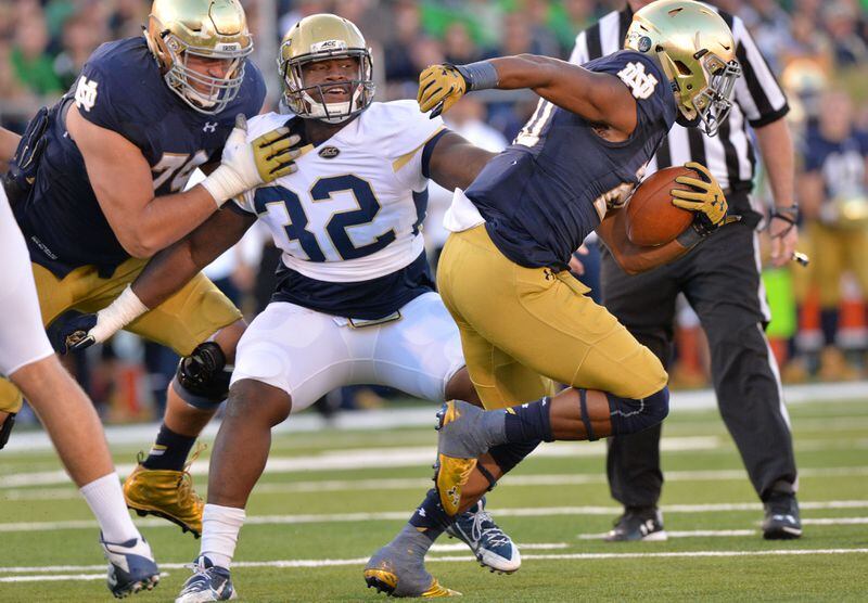 Notre Dame running back C.J. Prosise ran for 203 yards against Georgia Tech, 91 of them on this carry in the fourth quarter. HYOSUB SHIN / HSHIN@AJC.COM