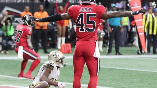 12/7/17 - Atlanta -  Atlanta Falcons middle linebacker Deion Jones (45) signals no catch after the Falcons held the Saints to a field goal on their first possession.  Atlanta Falcons play their rival, the New Orleans Saints in an NFL football game at Mercedes-Benz Stadium in Atlanta.   Curtis Compton / ccompton@ajc.com