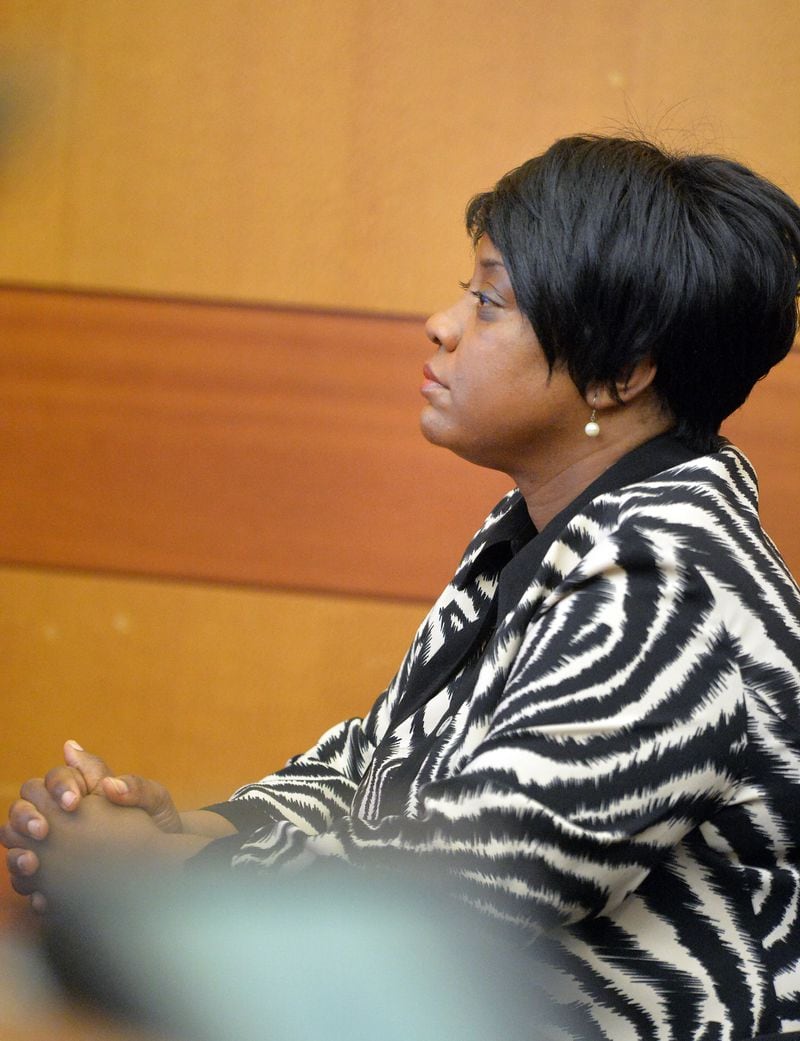 Tamara Cotman listens as her defense attorney presents a closing argument during the Atlanta Public Schools test-cheating trial in 2015. (Kent D. Johnson/ Atlanta Journal-Constitution)