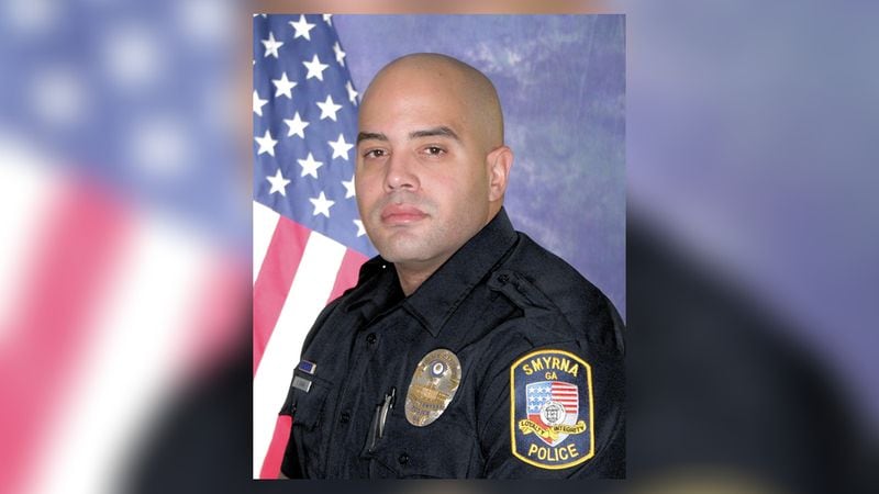 Officer Christopher Ewing was killed in a crash in April.