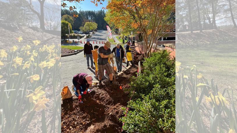 Volunteers in Johns Creek recently planted more than 1,000 bulbs at Emory Johns Creek Hospital outside the entrance to the Winship Cancer Institute. COURTESY CITY OF JOHNS CREEK
