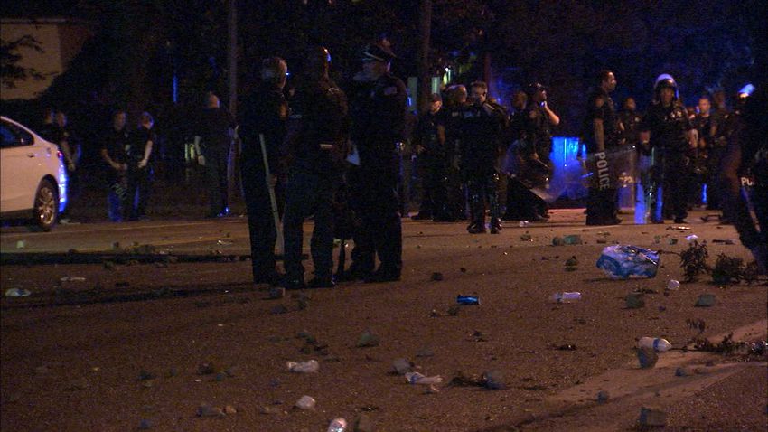 PHOTOS: Riot breaks out near scene of officer-involved shooting