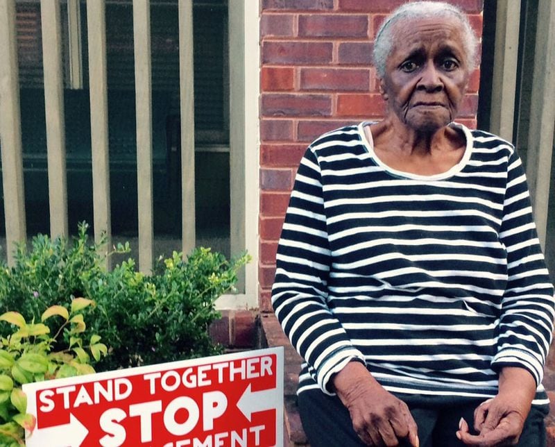 Longtime Summerhill activist Mattie Jackson outside her home, which stands where the city of Atlanta wants to put a reservoir/park to control flooding. (Photo by BILL TORPY)