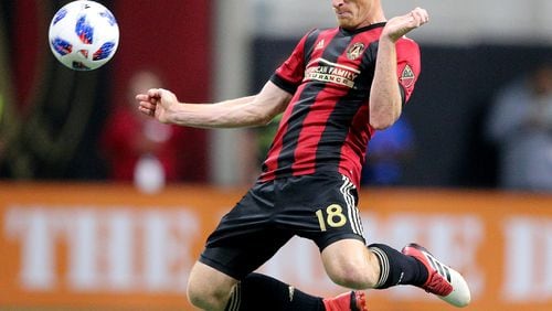 Atlanta United midfielder Jeff Larentowicz blocks a pass while defending against the New York Red Bulls during the first half in a MLS soccer match on Sunday, May 20, 2018, in Atlanta.   Curtis Compton/ccompton@ajc.com