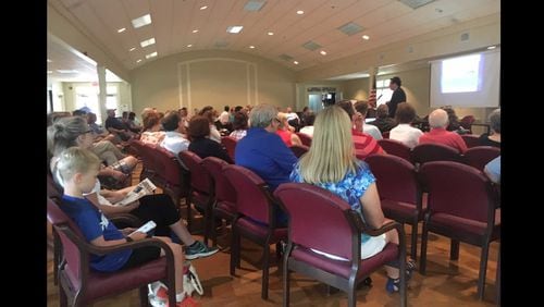About 200 residents fill a Cobb County community center on June 7, 2017, to voice their concerns about a proposed Lidl grocery store.