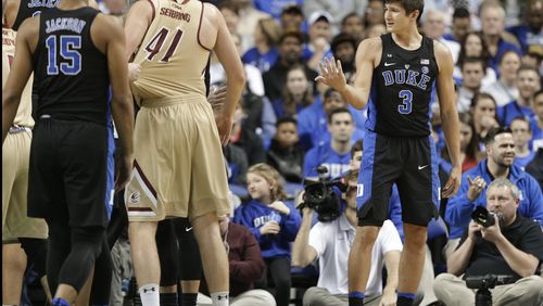 Duke's Grayson Allen (3) reacts after being called for a foul from tripping a Elon player in the first half of an NCAA college basketball game in Greensboro, N.C., Wednesday, Dec. 21, 2016. (AP Photo/Chuck Burton)