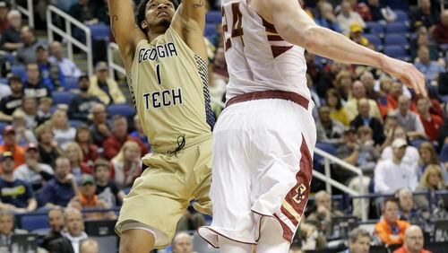 Georgia Tech's Tadric Jackson (1) shoots over Boston College's Dennis Clifford (24) during the second half of an NCAA college basketball game in the first round of the Atlantic Coast Conference tournament in Greensboro, N.C., Tuesday, March 10, 2015. Boston College won 66-65. (AP Photo/Gerry Broome) Georgia Tech completed its season with a record of 12-19. It's tied for the sixth most losses in a season in school history. (ASSOCIATED PRESS)