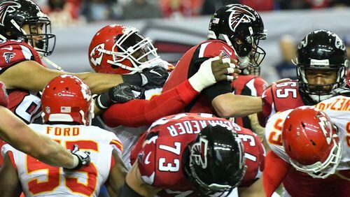 December 4, 2016 Atlanta - Atlanta Falcons quarterback Matt Ryan (2) is unable to get off a pass as he is brought down by Kansas City Chiefs outside linebacker Tamba Hali (91) during the second half in an NFL football game at the Georgia Dome on Sunday, December 4, 2016. Kansas City Chiefs won 29 - 28 over the Atlanta Falcons. HYOSUB SHIN / HSHIN@AJC.COM