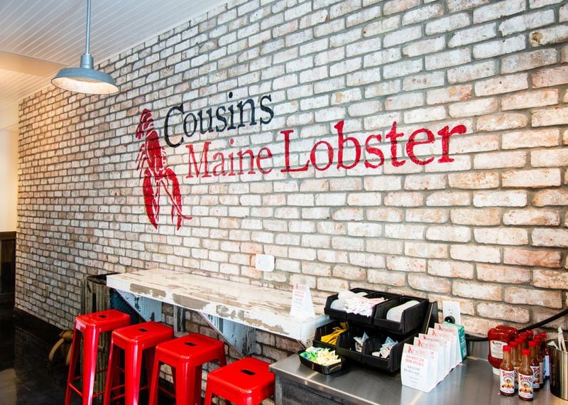 The beachy, white-washed interior of the Cousins Maine Lobster space at Lenox Square mall. CONTRIBUTED BY HENRI HOLLIS