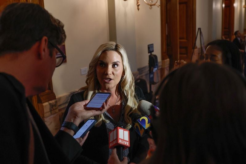 Courtney Kramer speaks to the media after filing paperwork to qualify as a candidate for Fulton County District Attorney at the Georgia State Capitol on Friday, March 8, 2024. (Natrice Miller/ Natrice.miller@ajc.com)