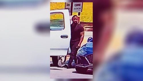 Fairburn police are searching for a man they say stole gas and ran over a gas station owner.
