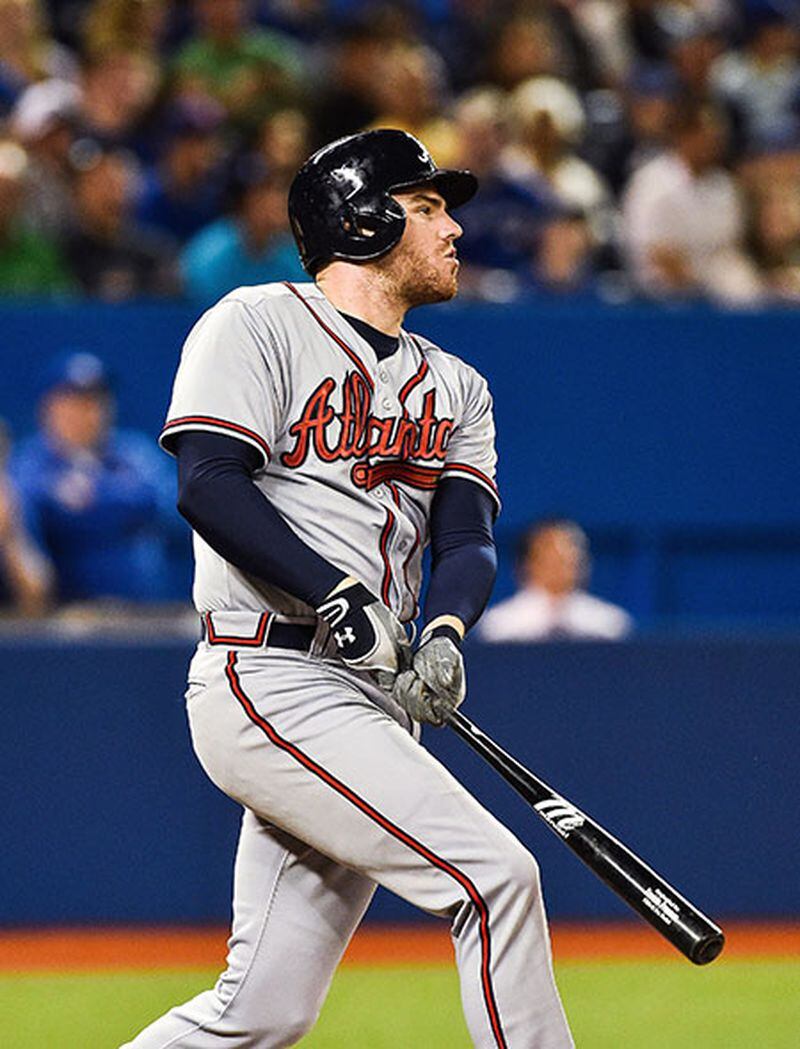 Atlanta Braves' Freddie Freeman watches his two-run home run in the third inning of a baseball game against the Toronto Blue Jays in Toronto, Saturday, April 18, 2015. (Aaron Vincent Elkaim/The Canadian Press via AP) MANDATORY CREDIT Freddie Freeman is one of the few in-their-prime standouts left on the Braves, and he's struggled in the second half of the season between two stints on the disabled list. (AP photo)