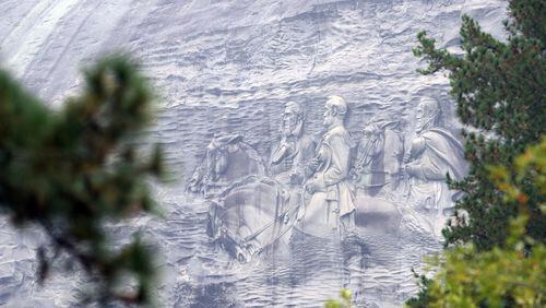 The controversy over Confederate history is attracting known white supremacists to a rally planned at Stone Mountain Park in April 2016. KENT D. JOHNSON/KDJOHNSON@AJC.COM