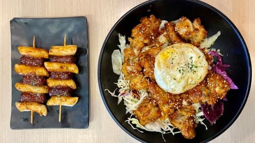 Tiger K Cupbob serves Korean street food in a fast-casual setting. Shown here are the so-tteok so-tteok (crispy rice noodles with cocktail sausages) and the Korean fried chicken cupbob.
Wendell Brock for The Atlanta Journal-Constitution