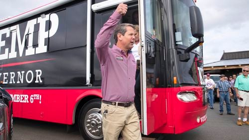10/01/2018 -- Jasper, Georgia -- Georgia Republican Gubernatorial candidate Brian Kemp exits his campaign bus during a campaign stop at Appalachian Gun, Pawn &Range in Jasper, Monday, October 1, 2018. Monday was the first day of Brian Kemp's weeklong bus tour where he and his campaign will visit 27 counties in 5 days. (ALYSSA POINTER/ALYSSA.POINTER@AJC.COM)