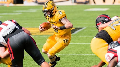 Kennesaw State quarterback Chandler Burks eyes a hole near the goaline during Saturday's matchup between Kennesaw State and North Greenville, Saturday, Sept. 30, 2017. (Special by Cory Hancock)