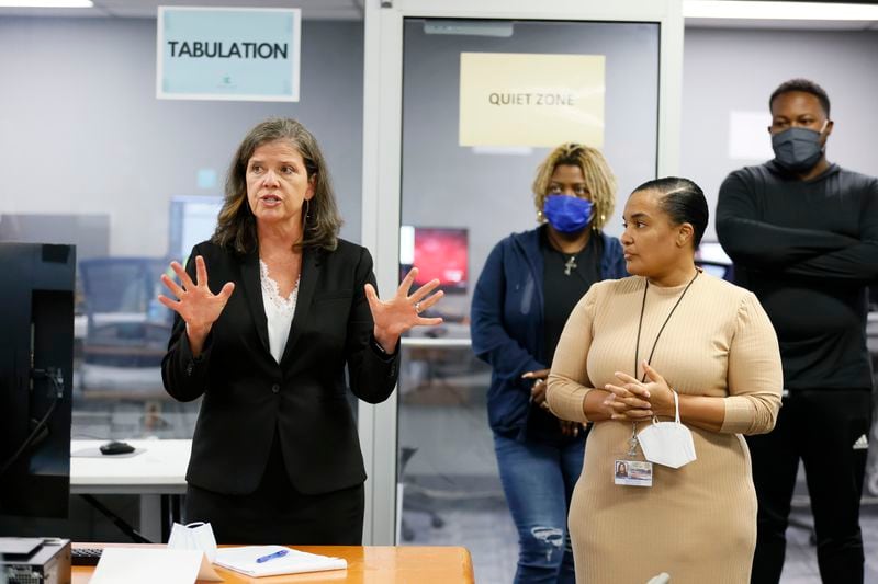 County attorney Viviane Ernstes (left) and DeKalb elections director Keisha Smith announced on Sunday morning that the recount of the votes for the District 2 County Commission race would be done by hand. (Photo: Miguel Martinez / miguel.martinezjimenez@ajc.com)